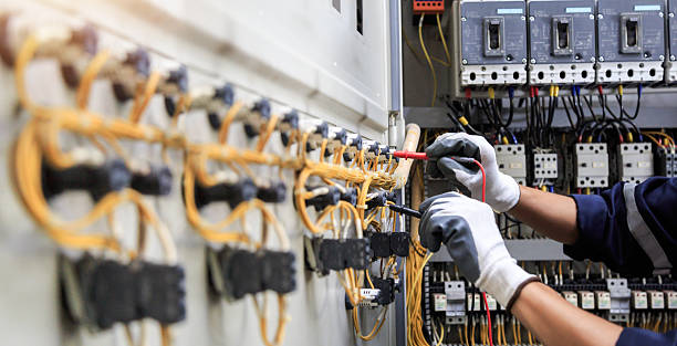 Professional Electrician technician working in Oakville, MO